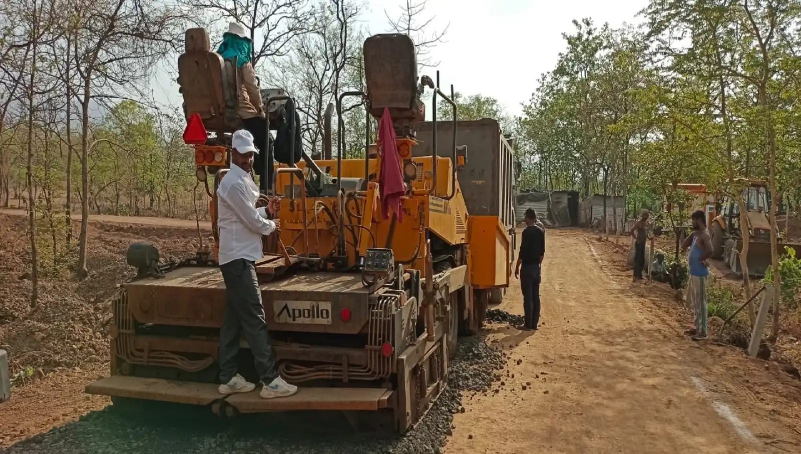Asphalt paver operating at the Karjat road project