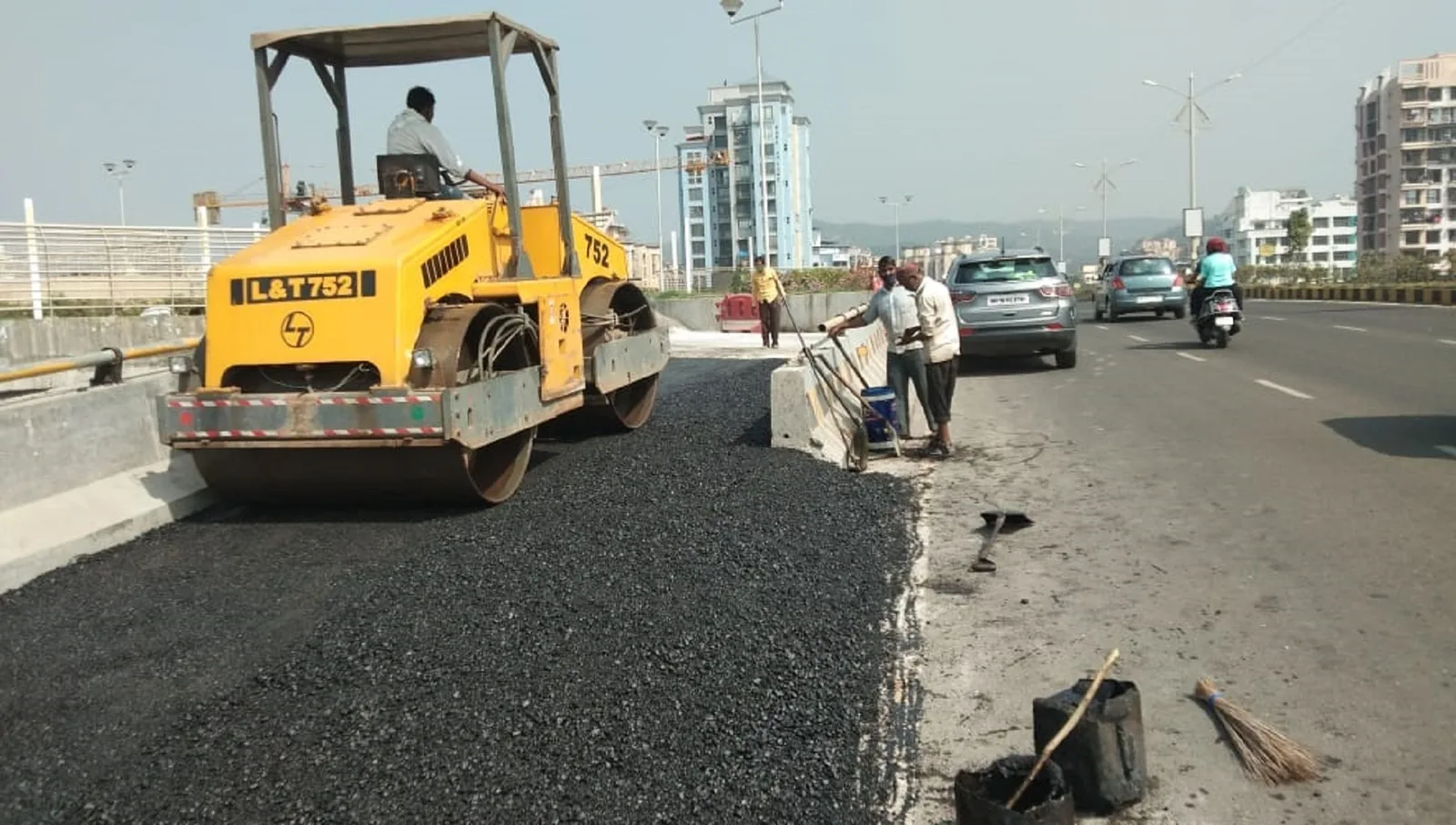 Road compaction work at the L&T Seawoods site
